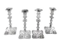 A Group of Four English Silver-Plate Candlesticks