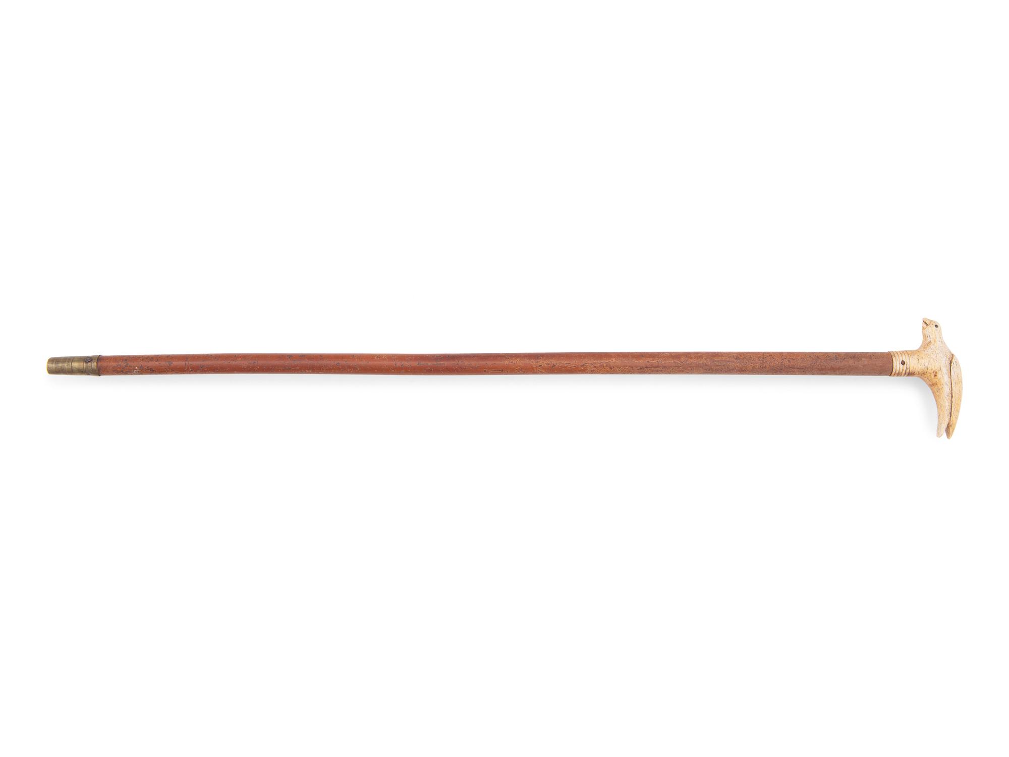 A Walking Stick with a Bird-Form Bone Handle