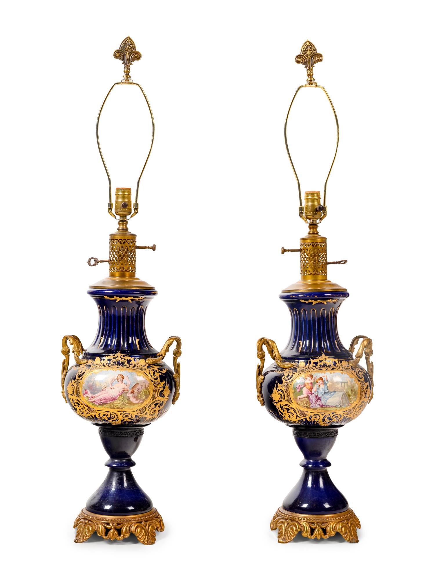 A Pair of Sèvres Style Porcelain Vases Mounted as Lamps
