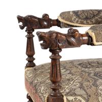A Renaissance Revival Carved Oak Armchair