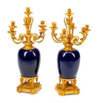 A Pair of Louis XV Style Gilt-Bronze-Mounted Porcelain Seven-Light Candelabra
