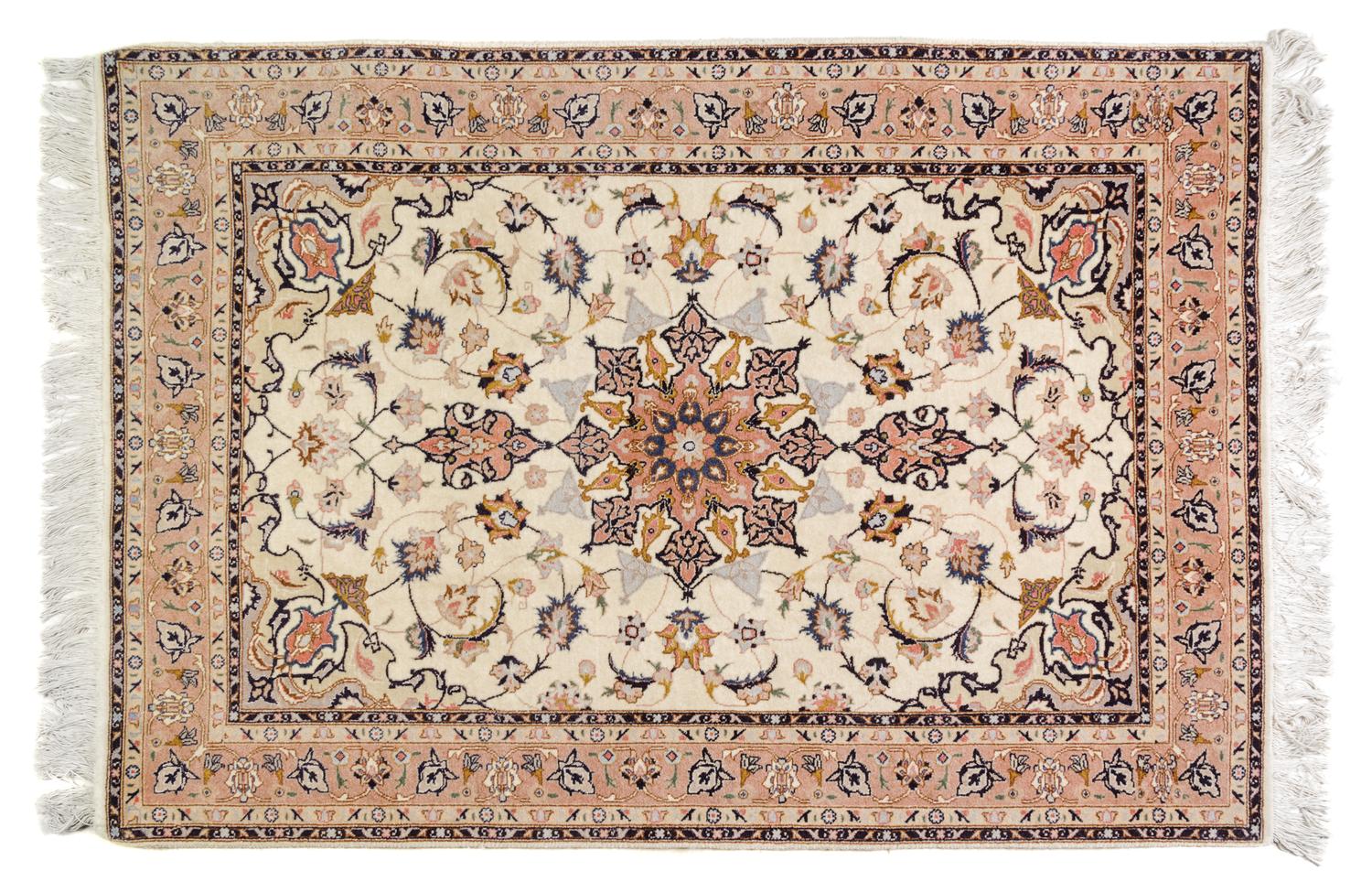A Tabriz Wool Rug 4 feet 9 inches x 3 feet 4 inches.