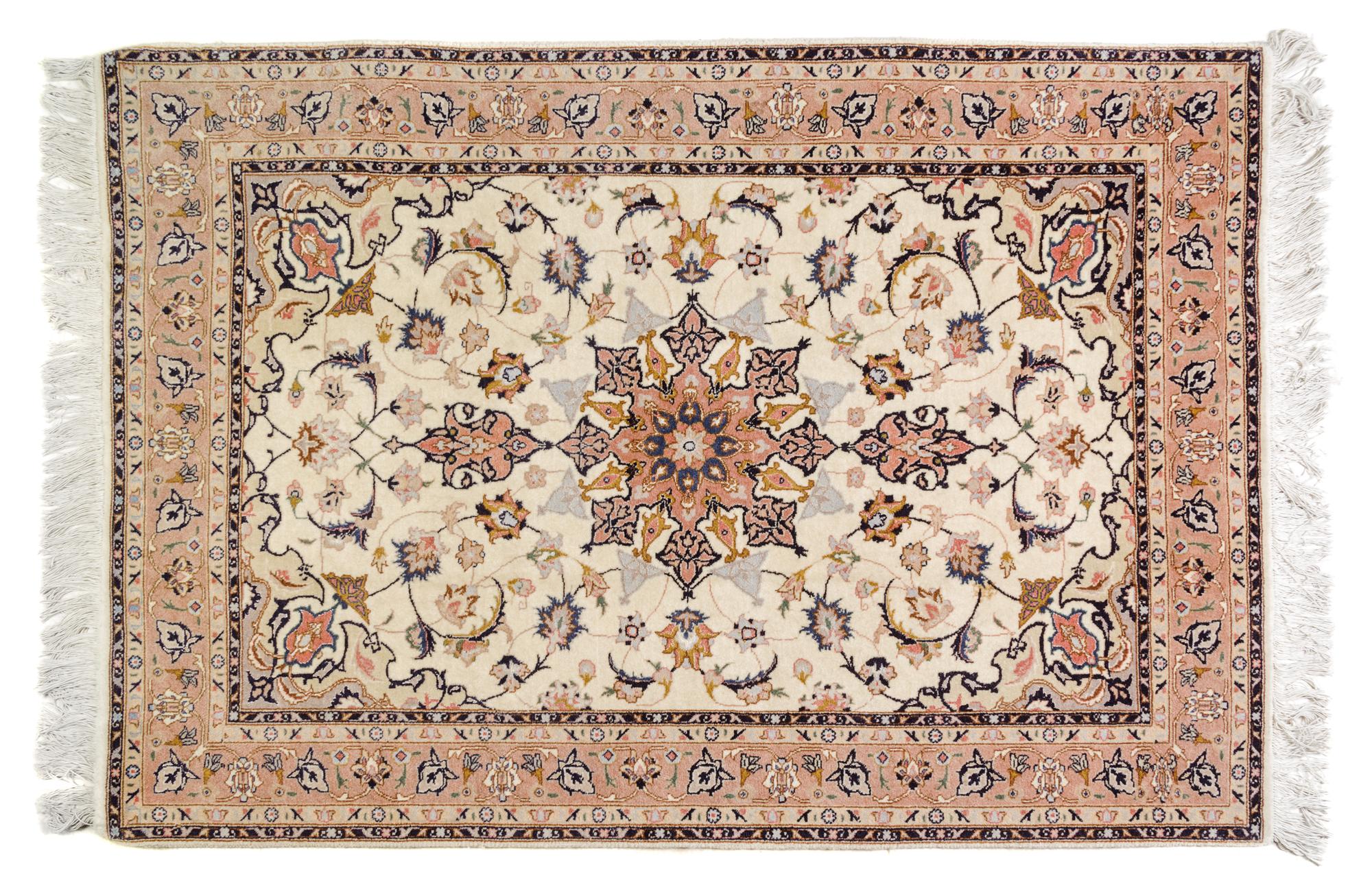 A Tabriz Wool Rug 4 feet 9 inches x 3 feet 4 inches.
