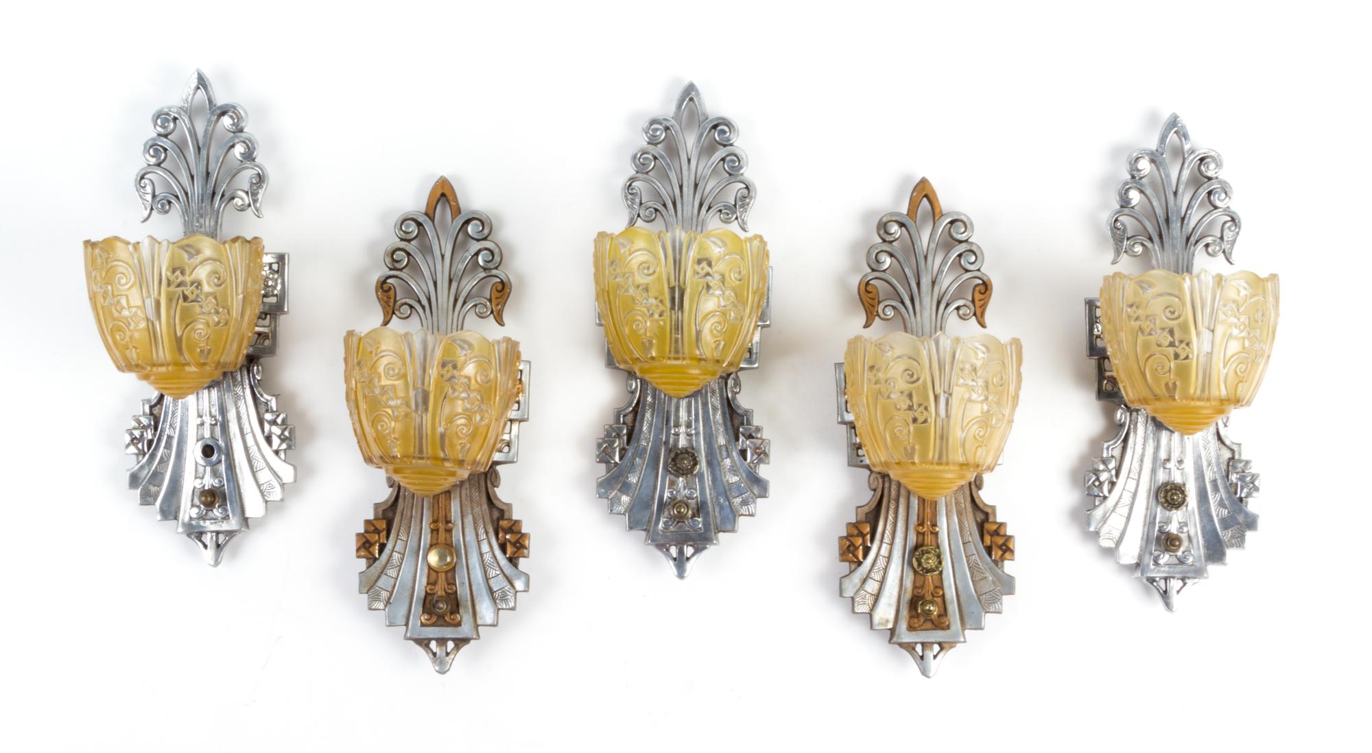 A Group of Seven Art Deco Style Silvered Metal Fixtures Height of chandelier 21 1/2 inches; height of sconce 14 1/4 inches. — LINCOLN MFG. CO., EARLY 20TH CENTURY