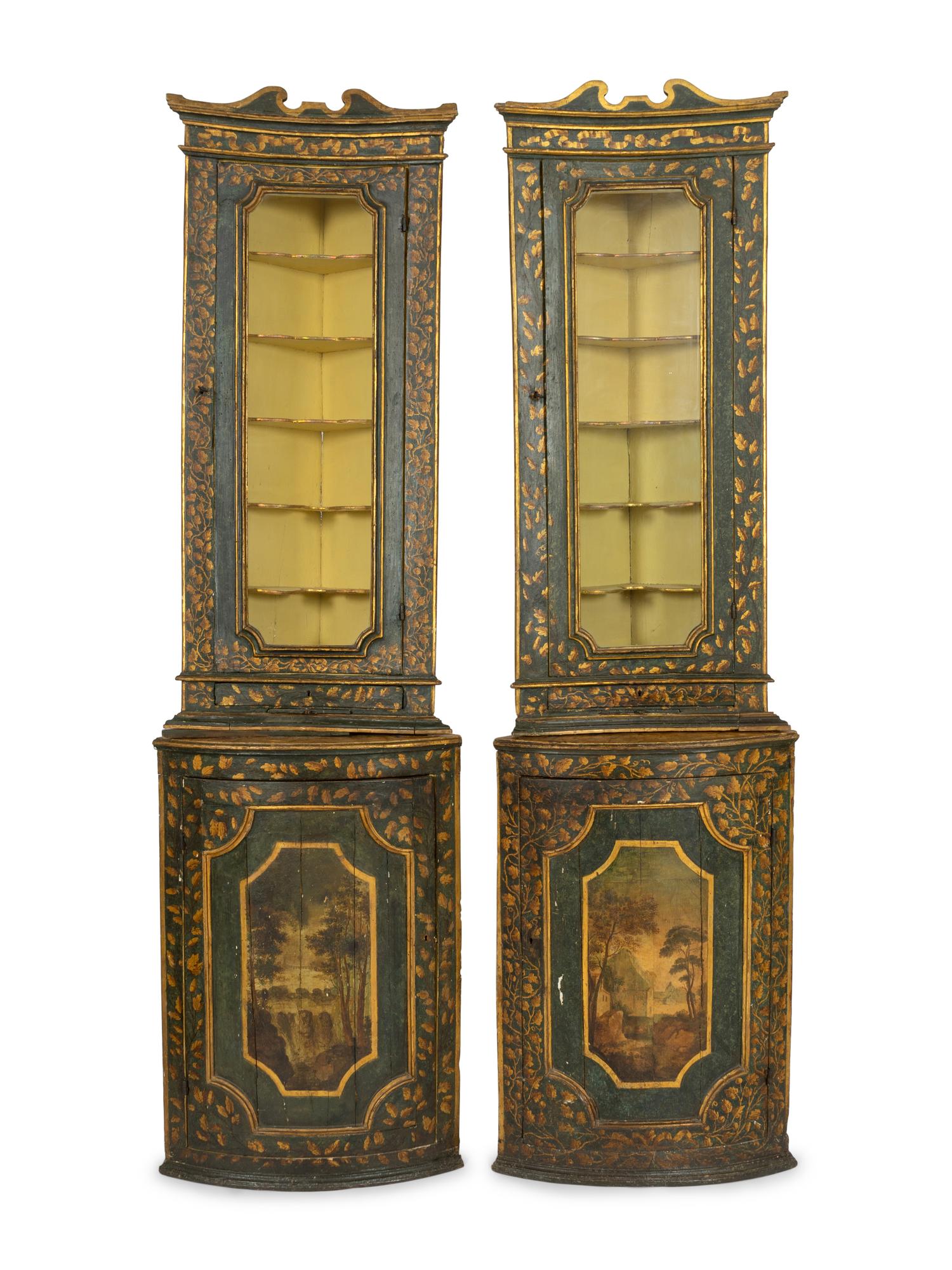 A Pair of Italian Painted Faux Marble and Parcel-Gilt Corner Cabinets