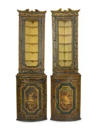 A Pair of Italian Painted Faux Marble and Parcel-Gilt Corner Cabinets