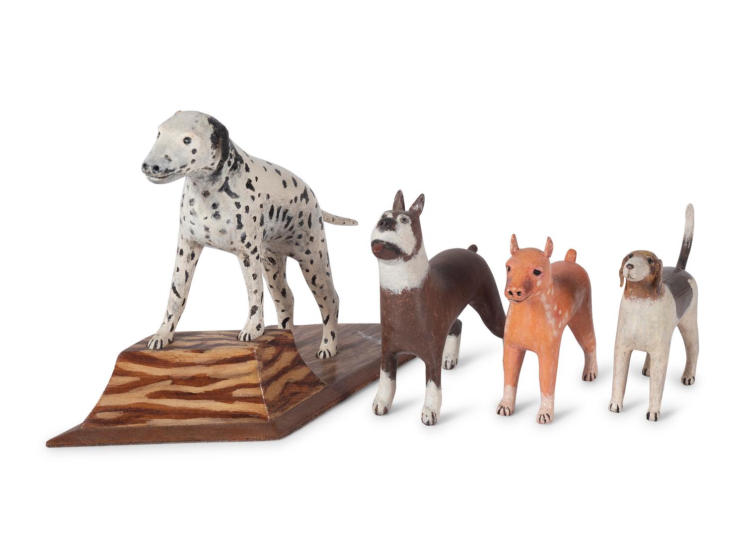 Four Folk Art Painted Wood Dog Figures