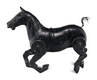 A Pressed Metal Horse Carousel Figure