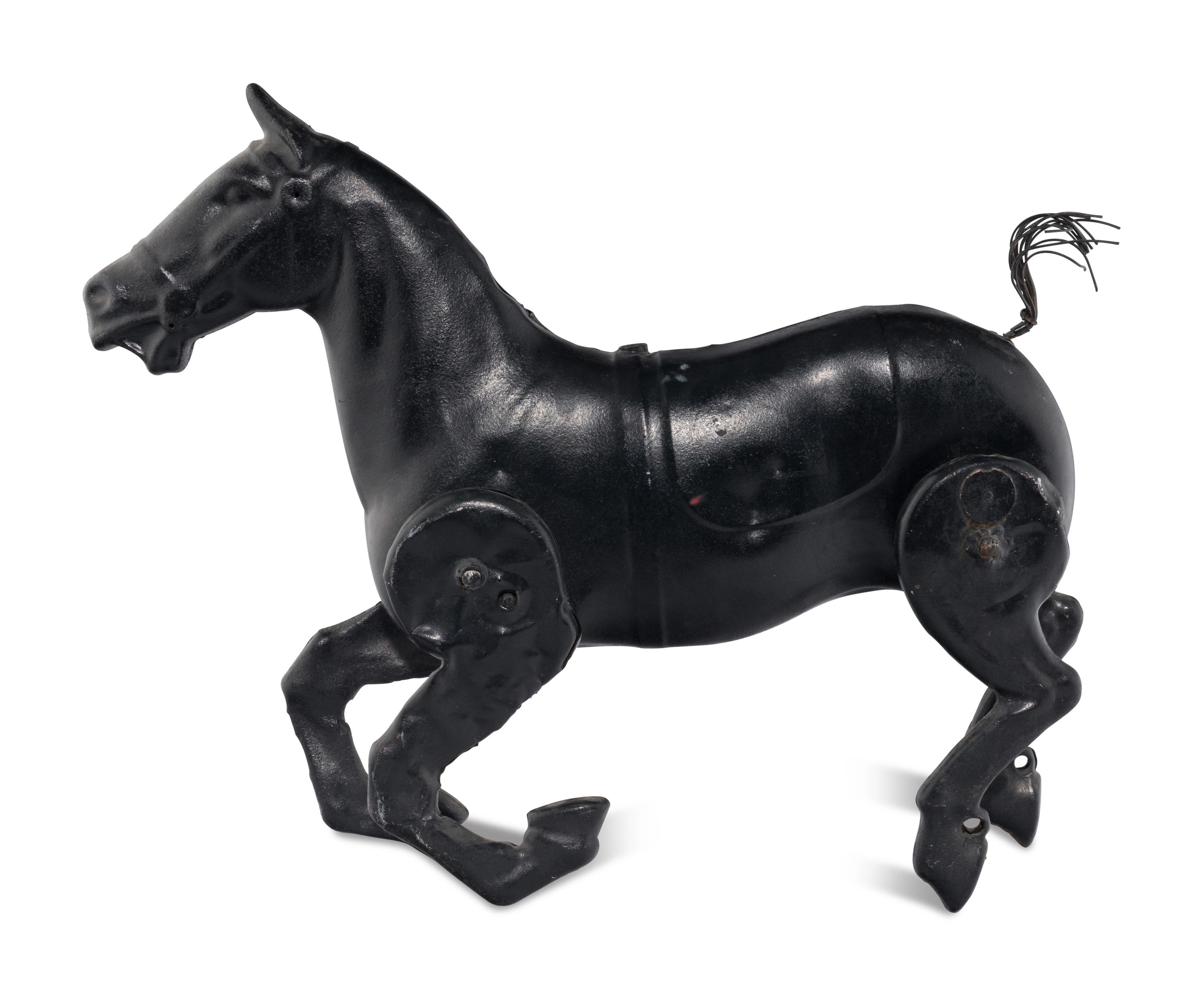 A Pressed Metal Horse Carousel Figure