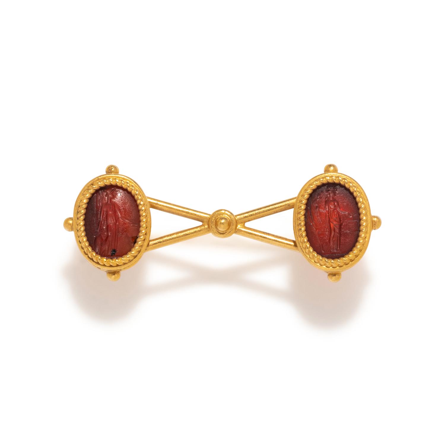 Two Roman Carnelian Ring Stones with the Goddesses Minerva and Themis — Set in a gold brooch
