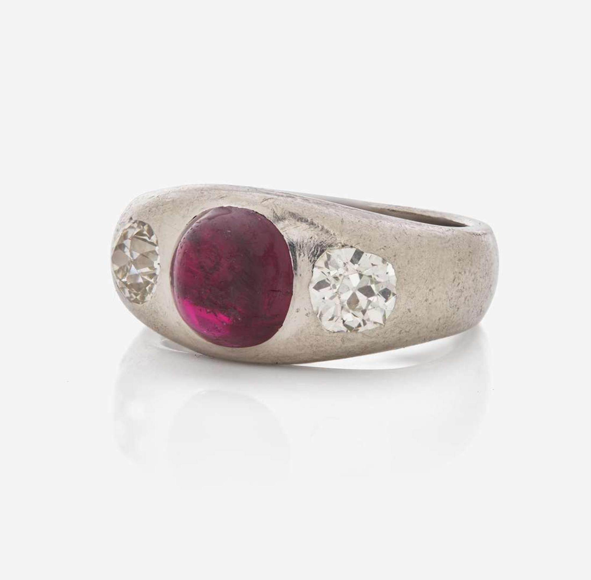 A Three-Stone Art Deco Platinum, Ruby, and Diamond Ring C.1920