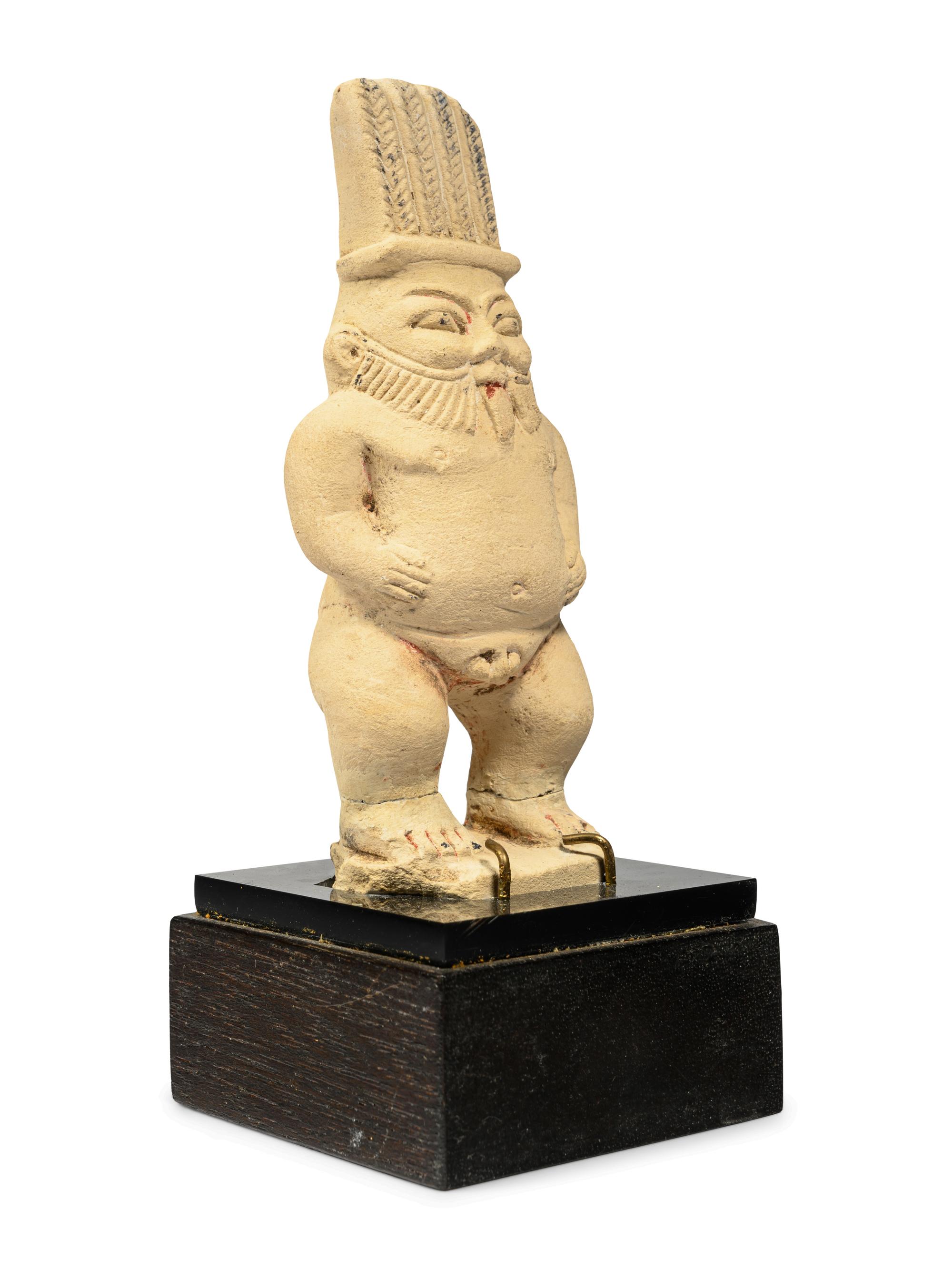 An Egyptian Painted Limestone Bes