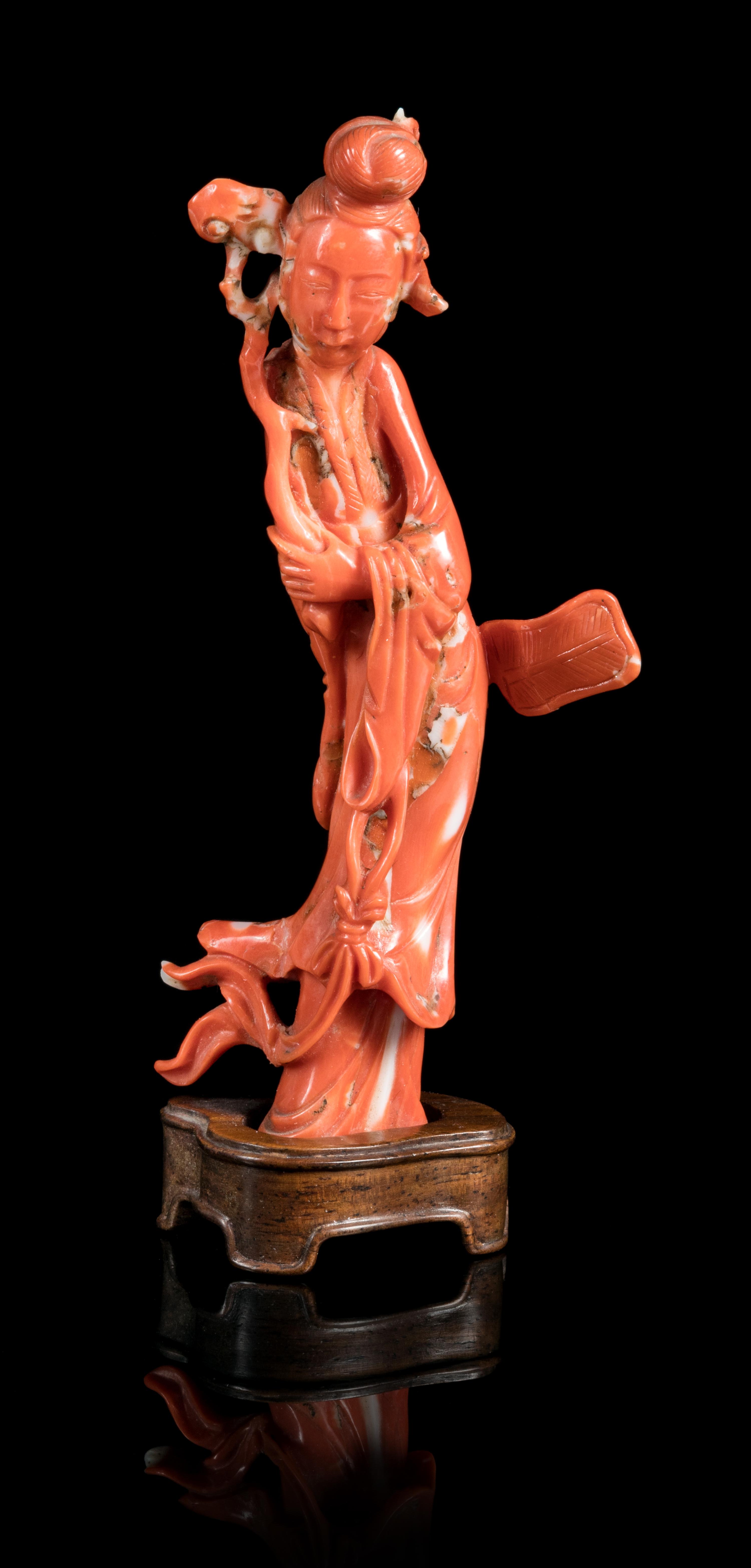 A Carved Red Coral Figure of a Lady Height 4 1/8 inches. — QING DYNASTY (1644-1912)