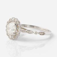 An 18K White Gold and Diamond Ring