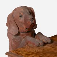 A Black Forest carved walnut and rosewood table with English Labrador Eduard Binder, Brienz, Switzerland, late 19th / early 20th century