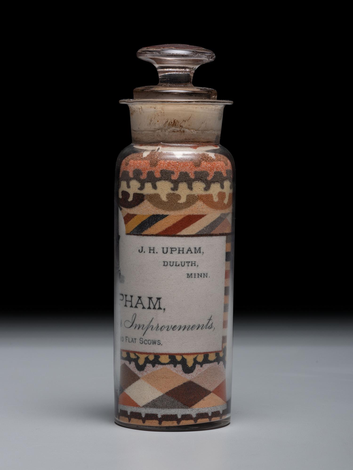 An Andrew Clemens (American, 1857-1894) Williams and Upham Contractors for River and Harbor Improvements Sand Bottle