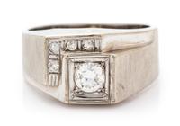 A 14 Karat White Gold and Diamond Ring, 3.50 dwts.