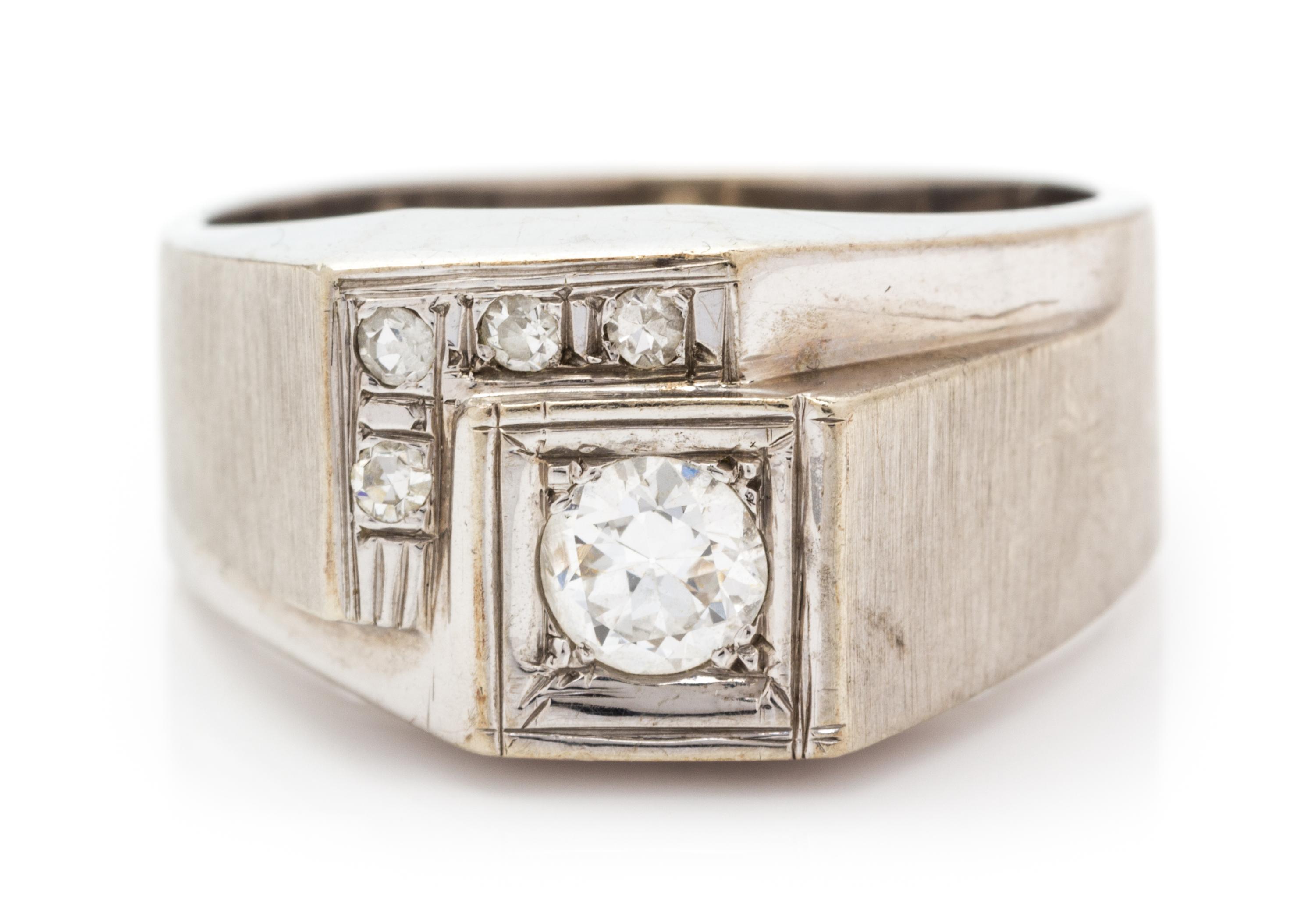 A 14 Karat White Gold and Diamond Ring, 3.50 dwts.