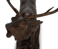 A Swiss Black Forest Carved Walnut Figure of an Elk
