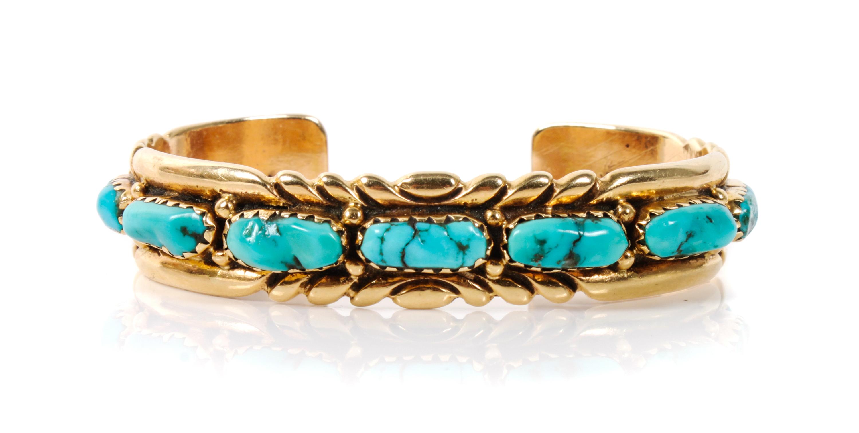 A Navajo Yellow Gold and Turquoise Cuff Bracelet, Robert Begay Length 5 3/8 x opening 7/8 x width 1/2 inches.