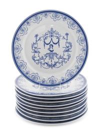 A Set of Twenty Porcelain Chargers