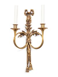 A Set of Seven Louis XVI Style Brass Two-Light Sconces