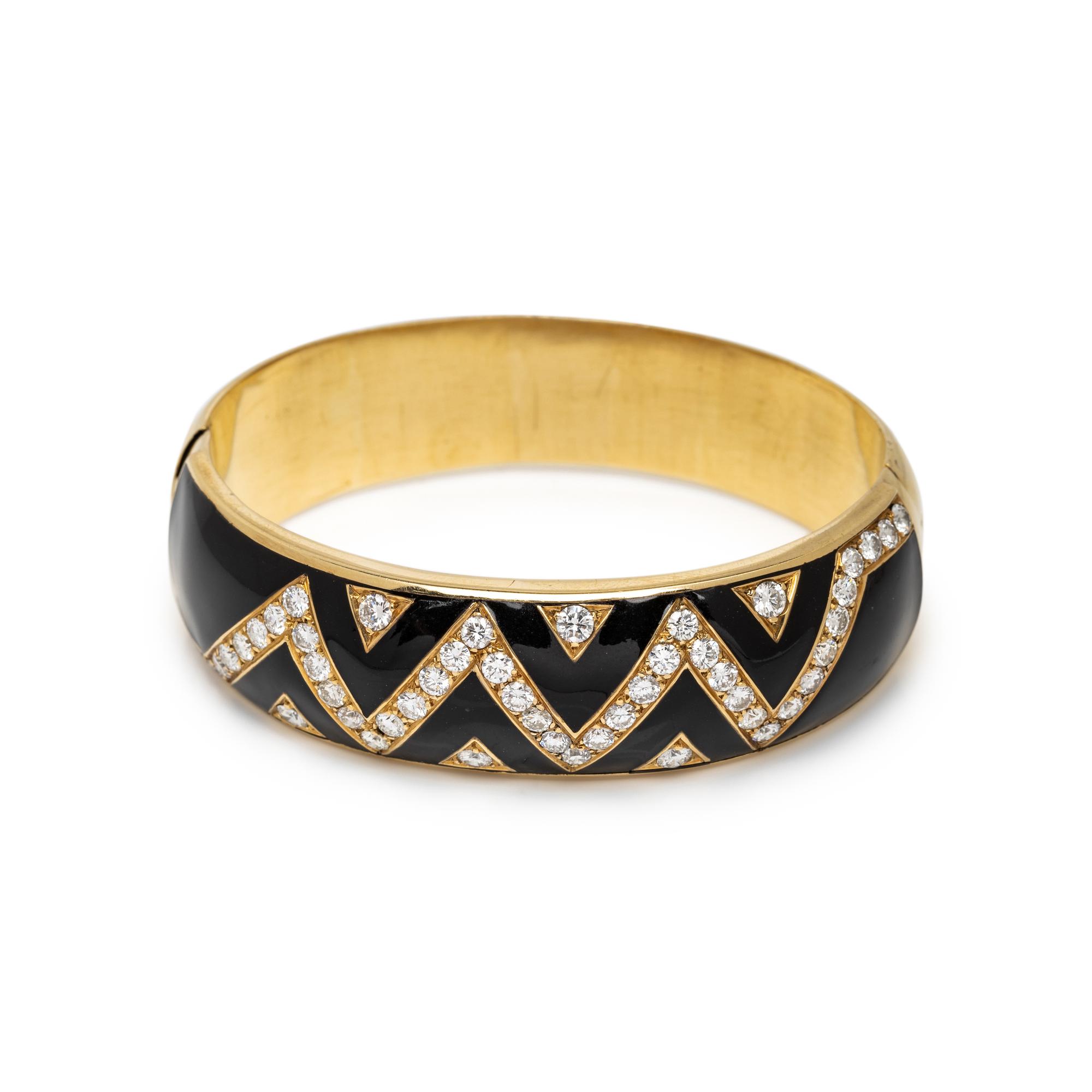 YELLOW GOLD, BLACK ENAMEL AND DIAMOND HINGED BANGLE