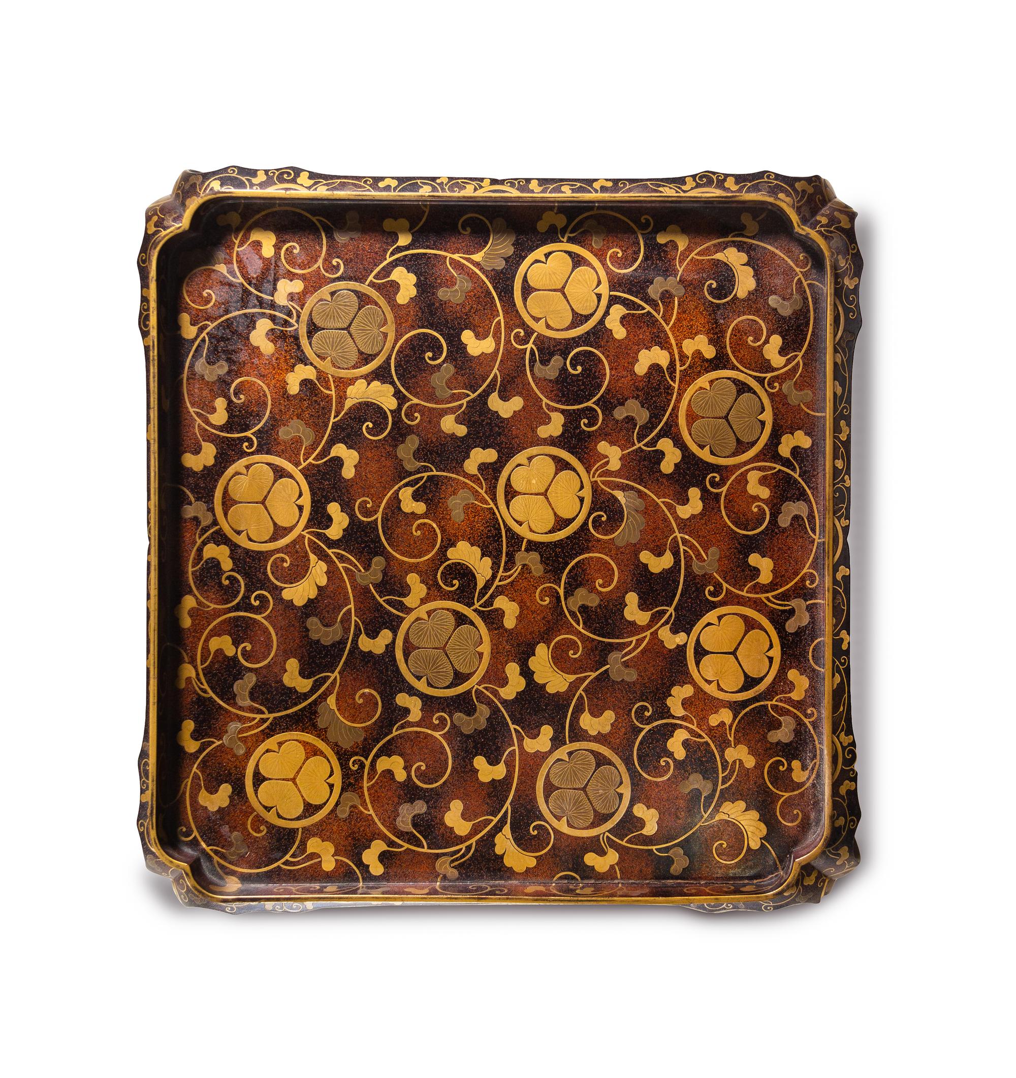 A Set of Three Japanese Gilt Decorated Lacquer Nesting Tables