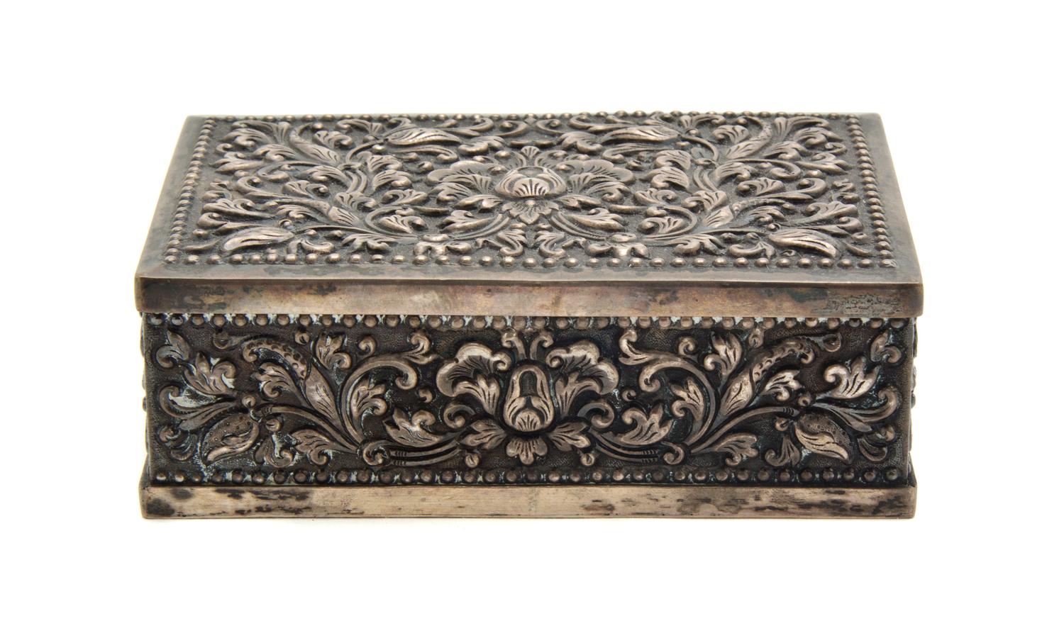 A Continental Silver Mounted Cigarette Box, Width 5 inches.