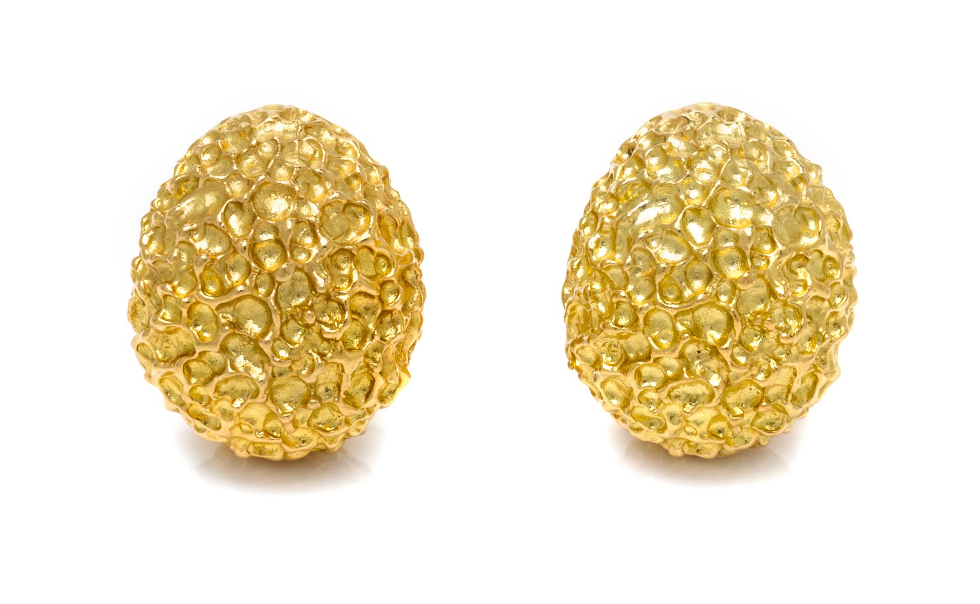 A Pair of 14 Karat Yellow Gold Earclips, 18.20 dwts.