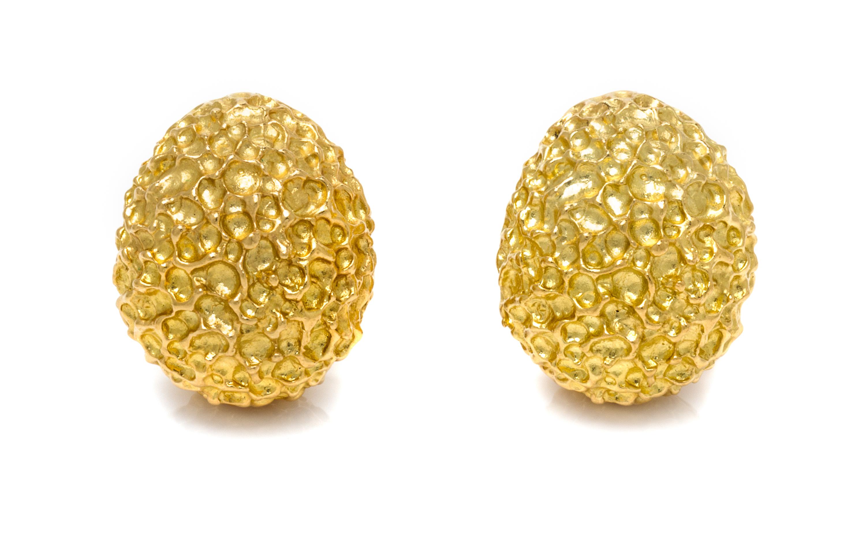 A Pair of 14 Karat Yellow Gold Earclips, 18.20 dwts.