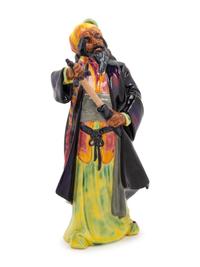 A Royal Doulton Figurine of Blue Beard and an Associated Ceramic Figurine