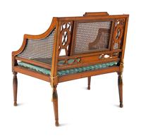An Edwardian Painted and Caned Armchair