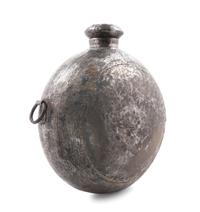 A Large Indonesian Hammered Metal Vessel