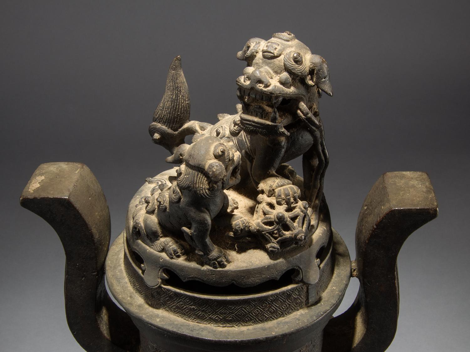 A Bronze Tripod Incense Burner and Cover