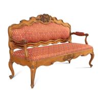An Italian Carved Walnut Settee