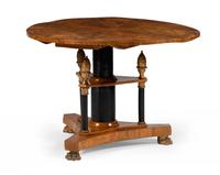 A Continental Neoclassical Parcel Gilt and Ebonized Burlwood Veneered Dining Table