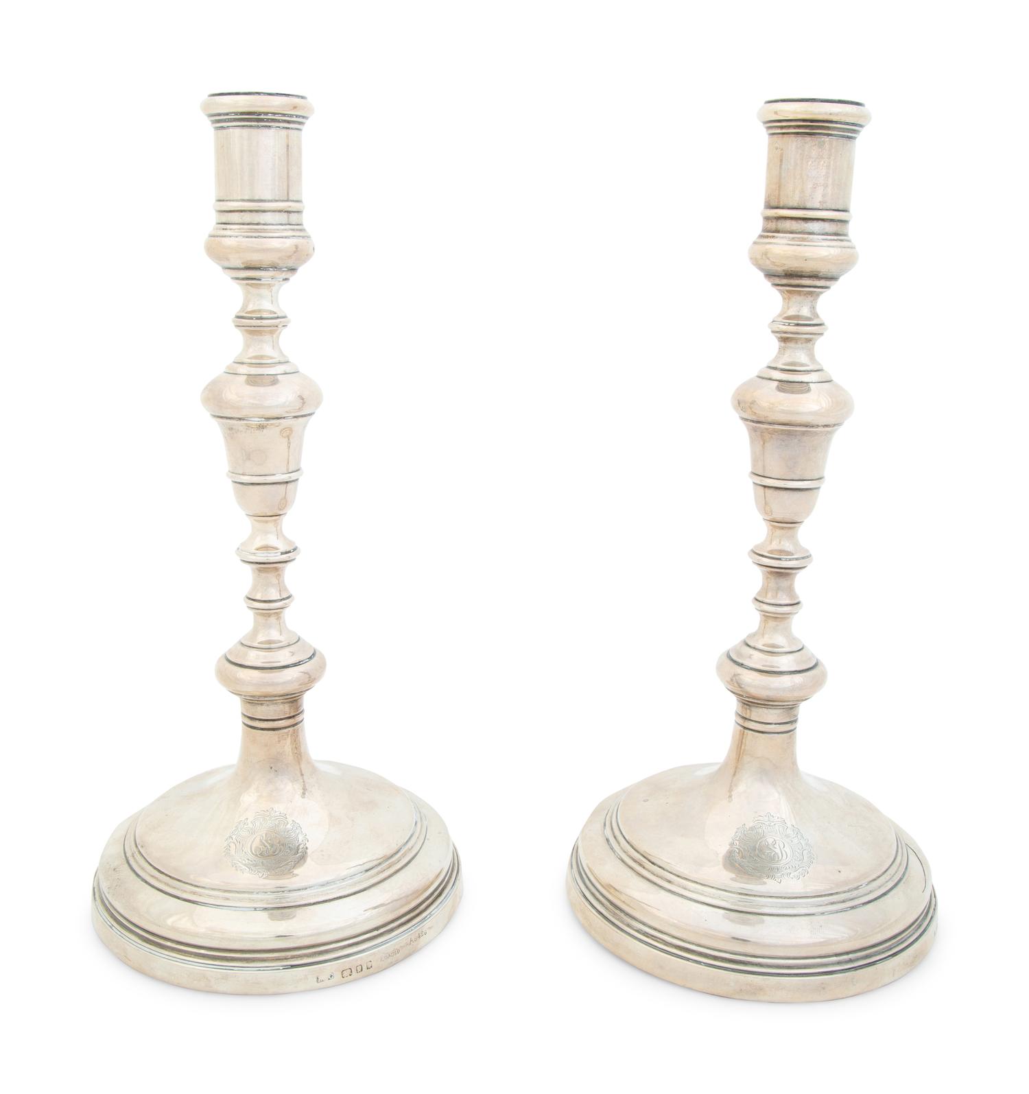 A Pair of English Weighted Silver Candlesticks