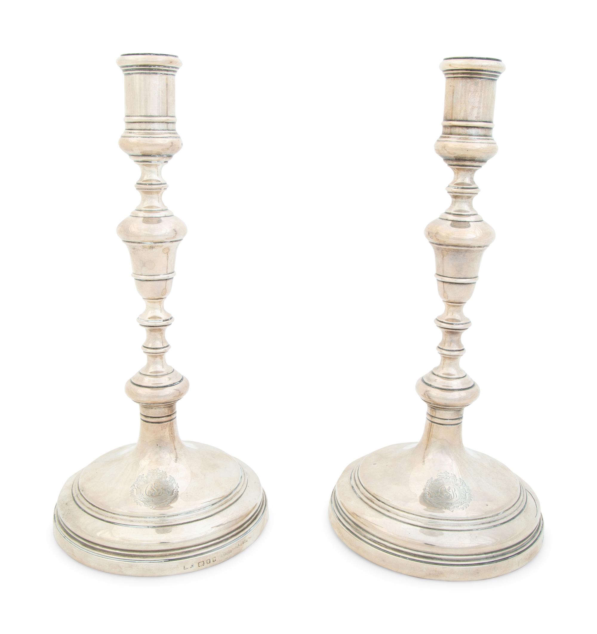 A Pair of English Weighted Silver Candlesticks