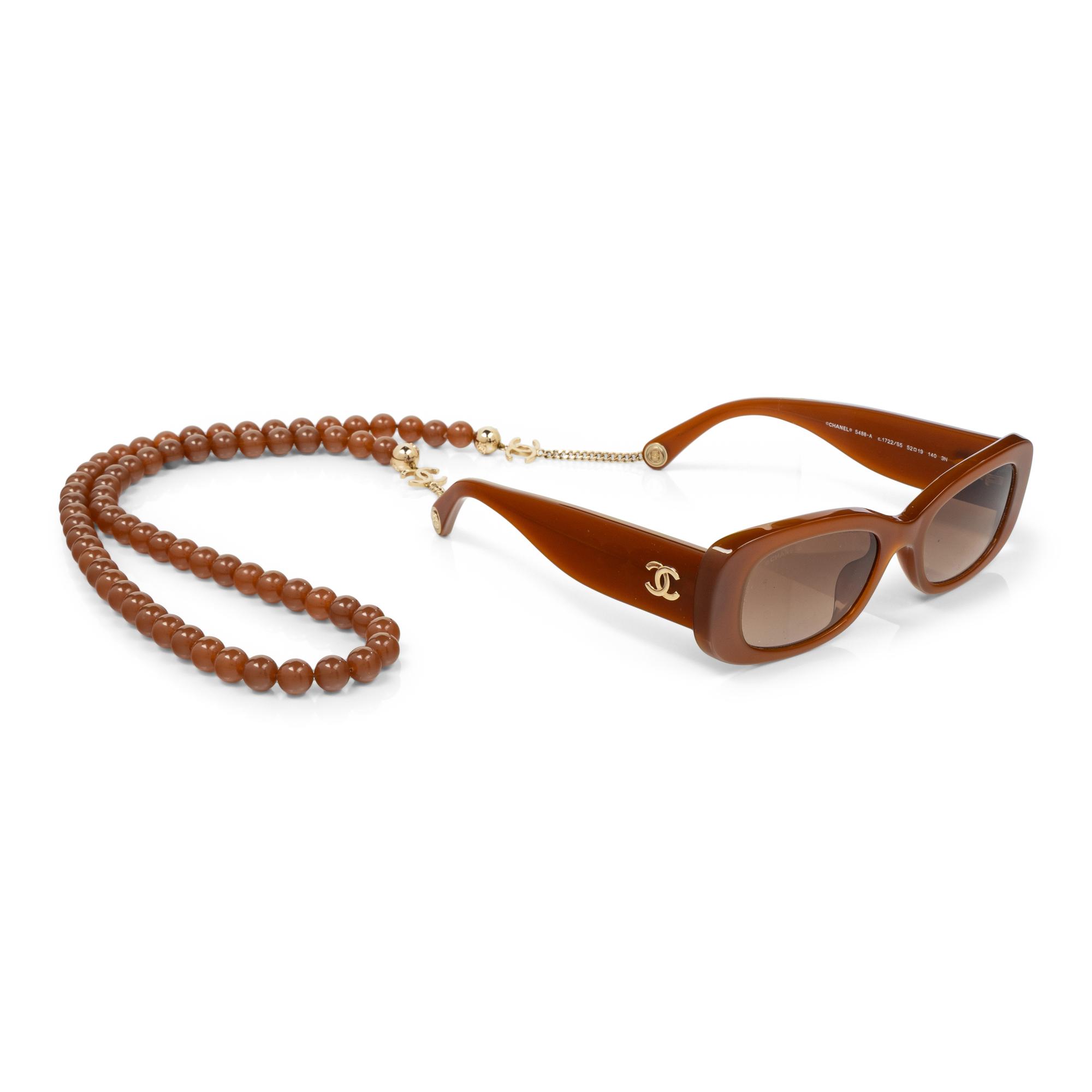 CHANEL, SUNGLASSES & BEADED CHAIN