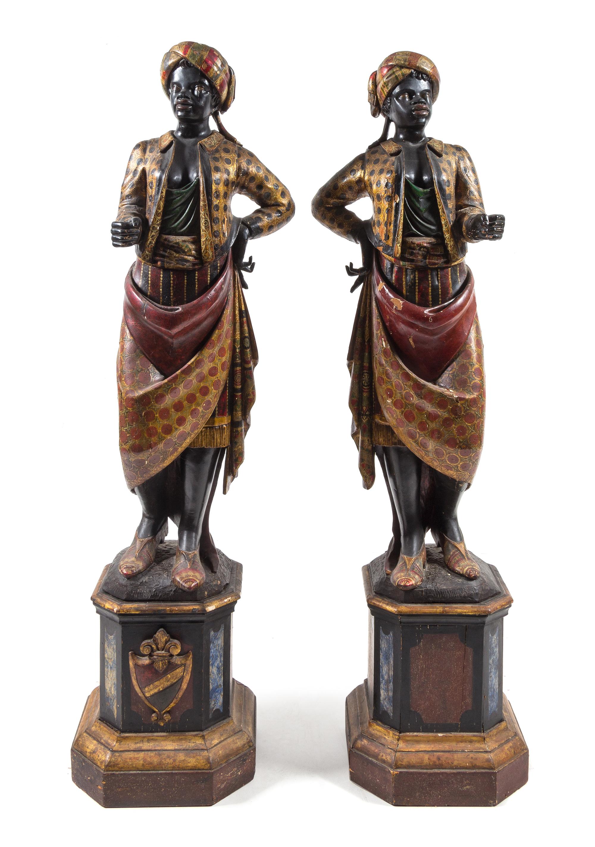 A Pair of Venetian Blackamoor Figures Height 72 inches. — LATE 19TH CENTURY