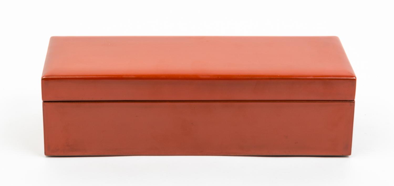 A Red Lacquer Box and Cover Height 3 1/2 x width 13 x depth 4 1/2 inches.