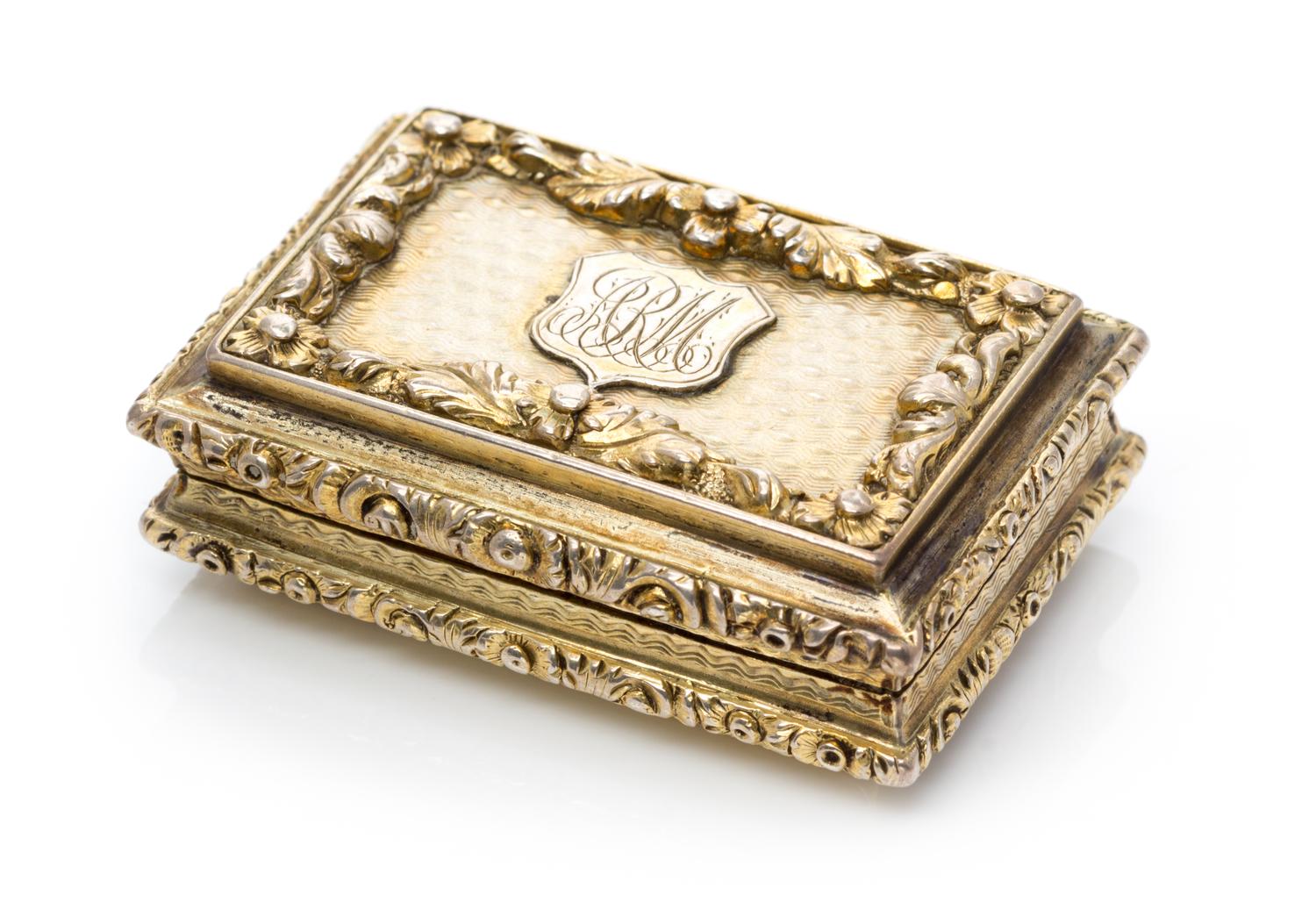 A Victorian Silver-Gilt Vinaigrette, Nathaniel Mills, Birmingham, Mid-19th Century, the lid with applied floral and foliate decoration