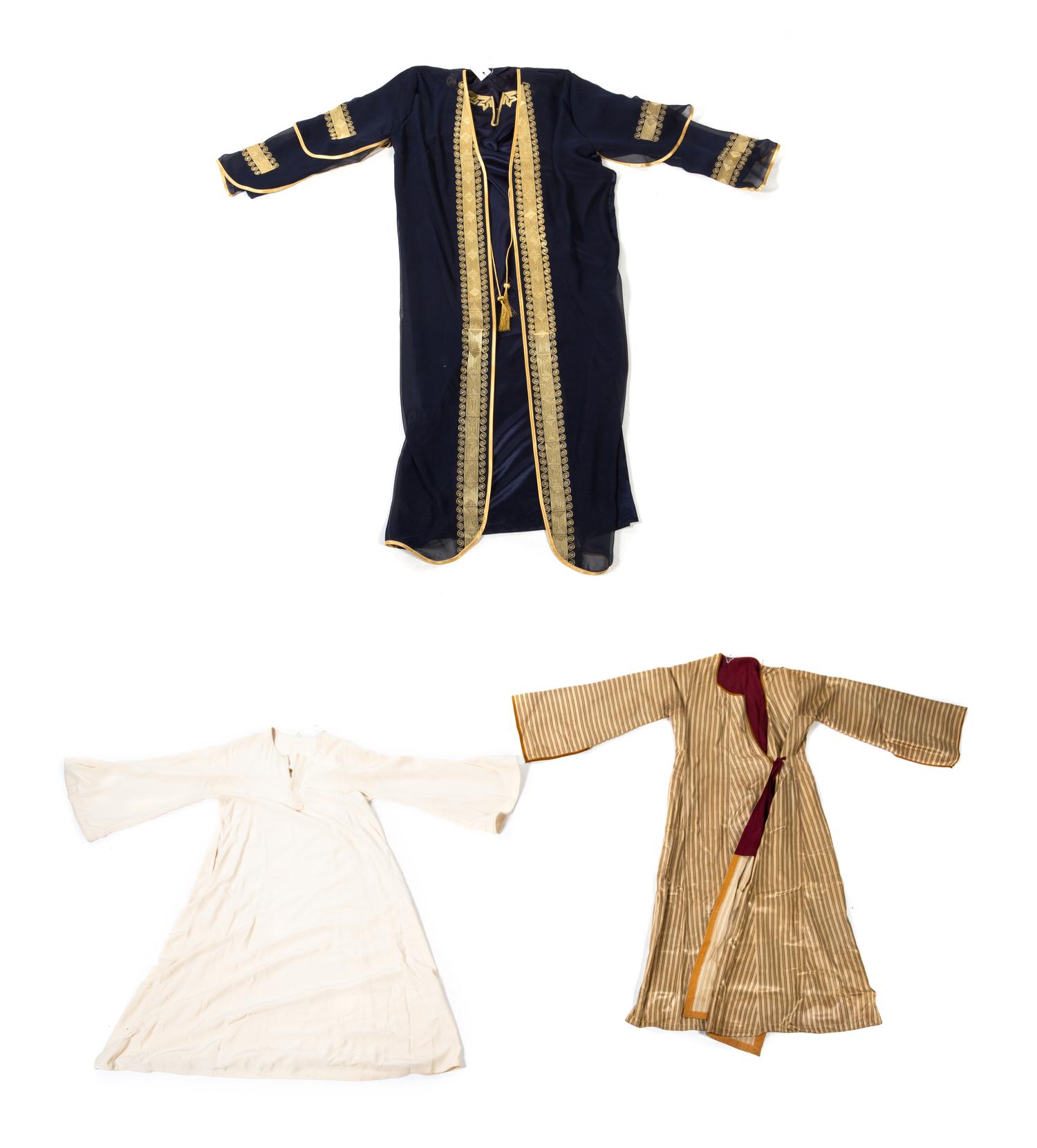 Three Middle Eastern Garments Approximate length of first mentioned 54 inches. — 20TH CENTURY