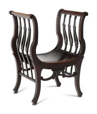 An American Victorian Carved Curule Chair