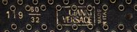 A Gianni Versace Yellow Leather Belt with Rhinestone Medallions, Size 60/32.