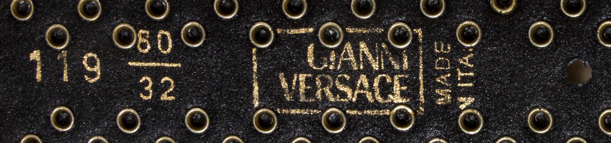 A Gianni Versace Yellow Leather Belt with Rhinestone Medallions, Size 60/32.