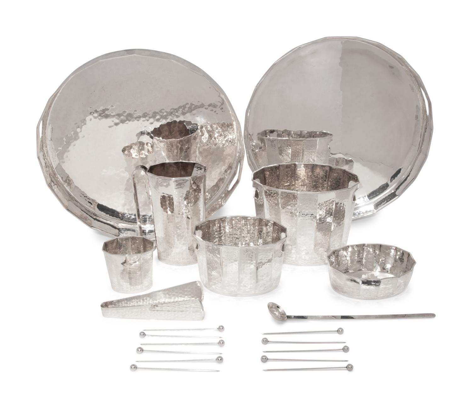 A Set of Italian Hand Hammered Silver-Plate Table Articles