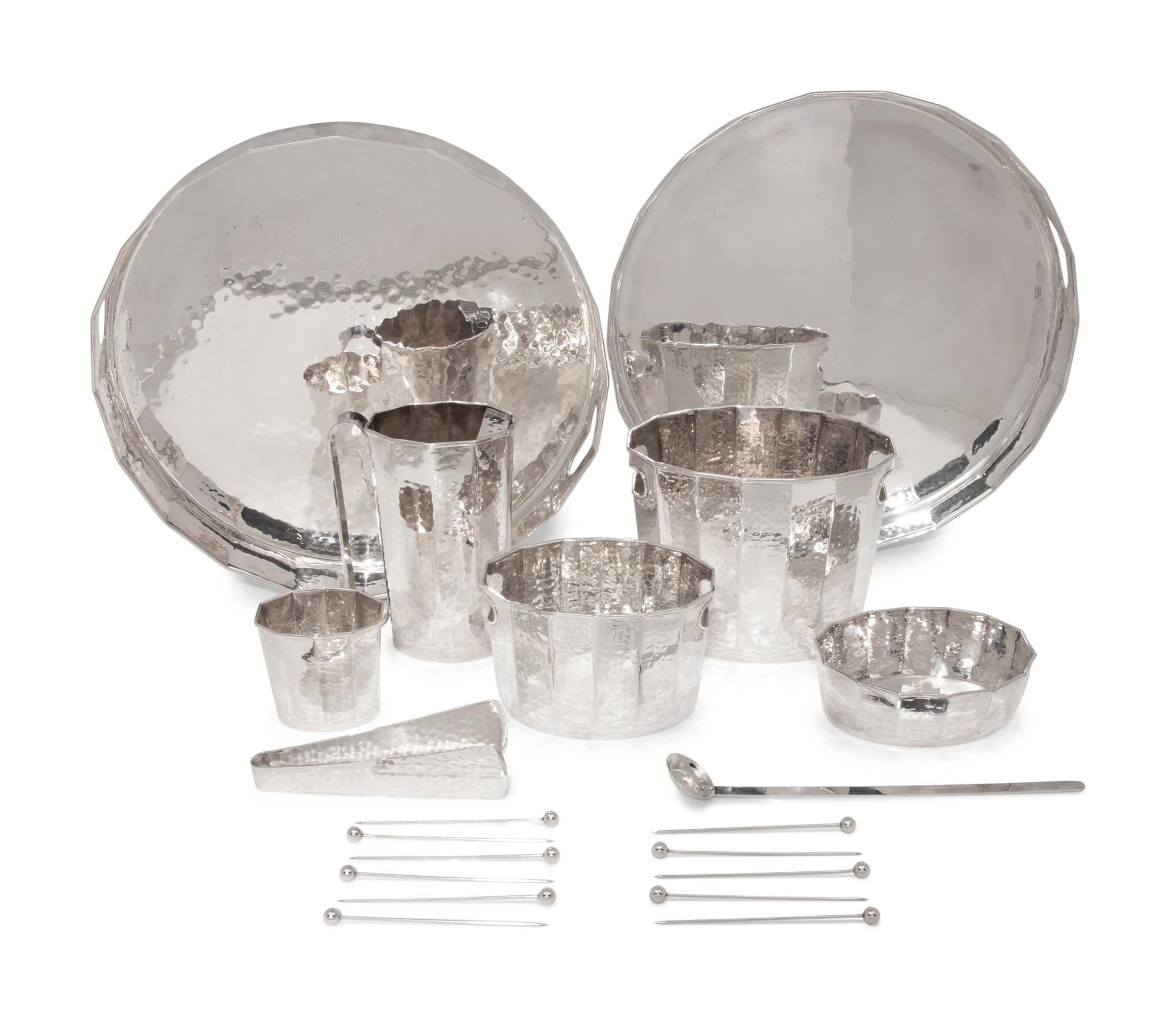 A Set of Italian Hand Hammered Silver-Plate Table Articles
