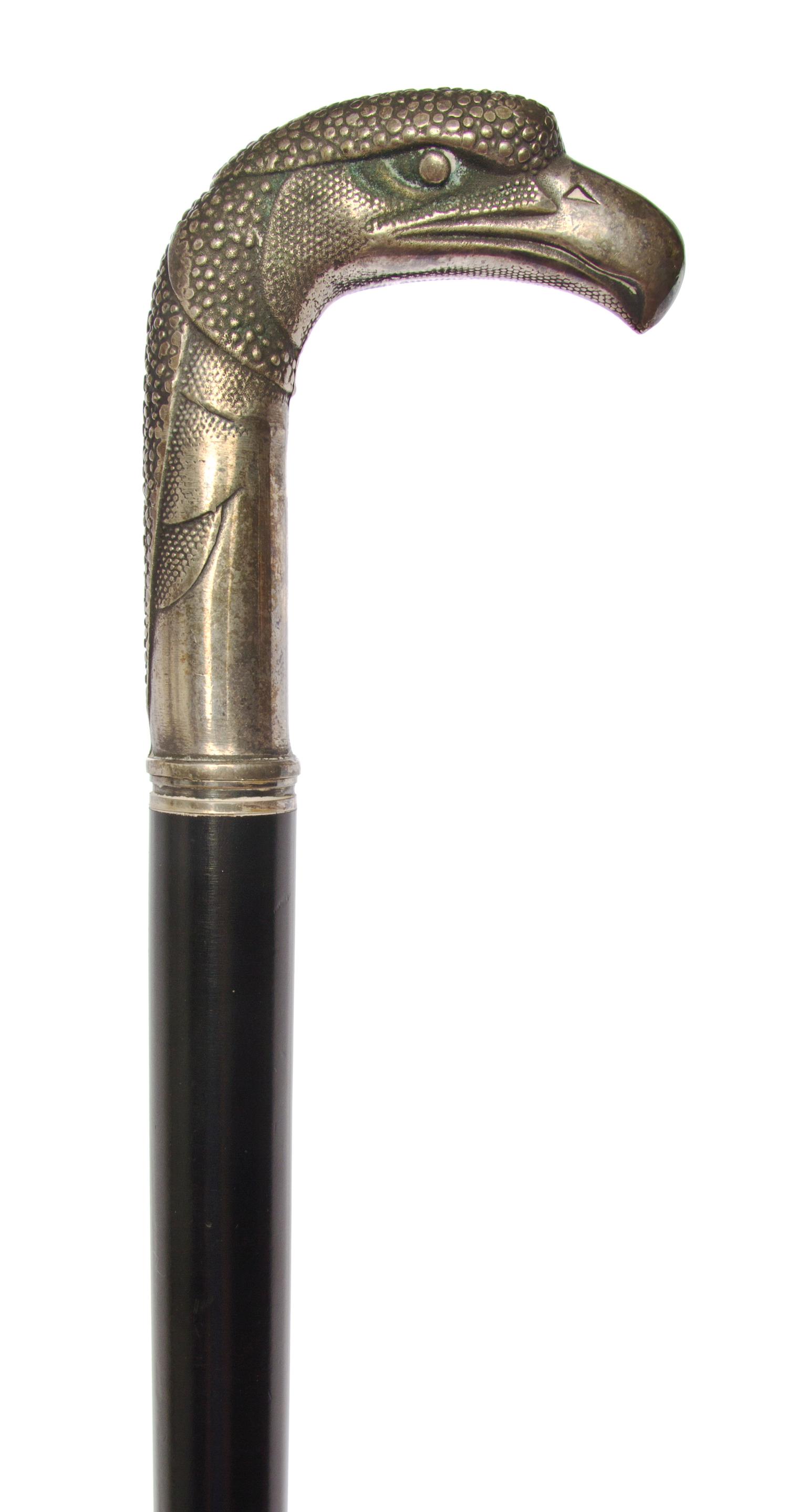 A Silvered Metal Sword Cane, Length of handle 4 x length overall 36 1/2 inches.